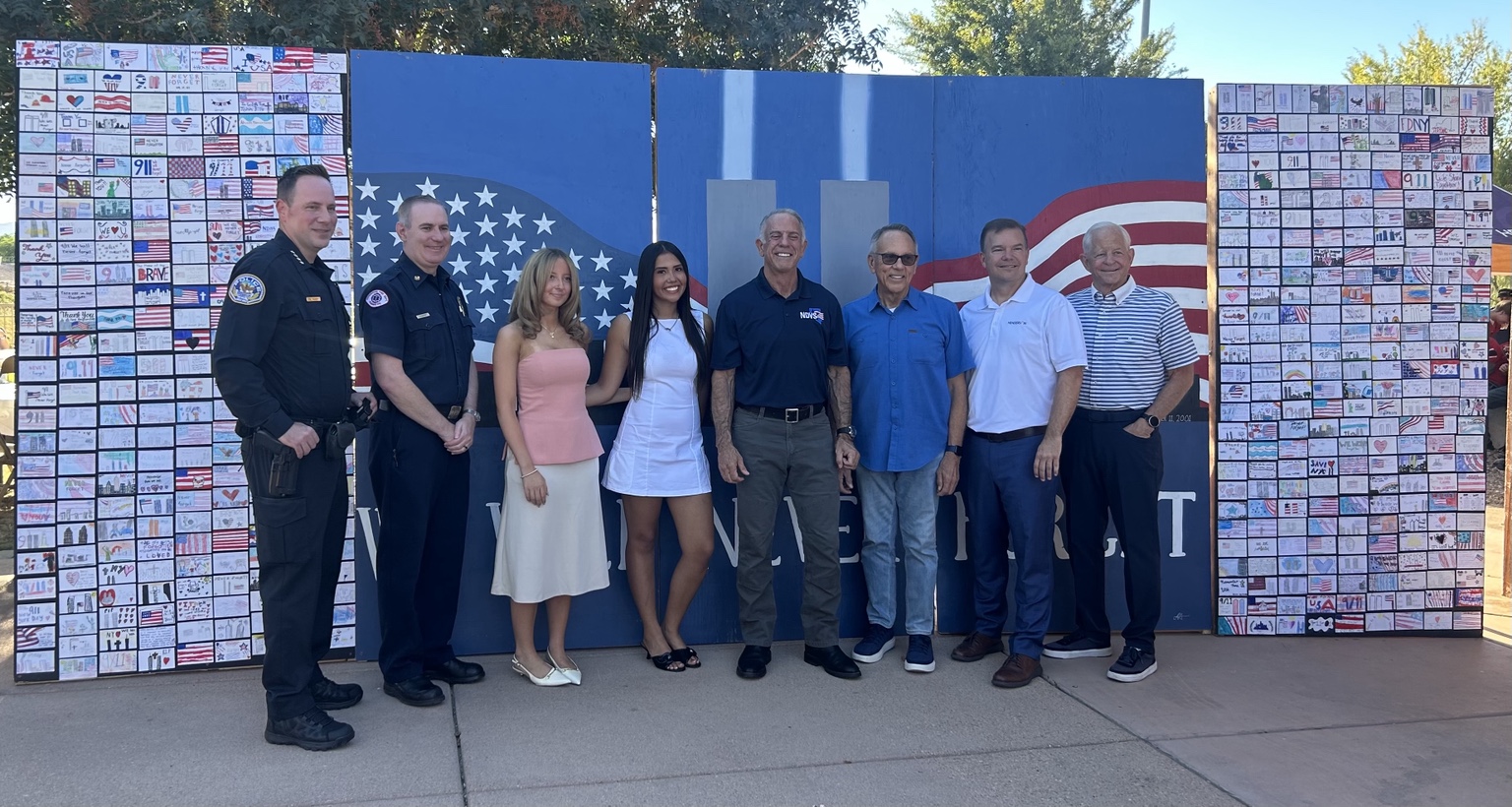 Aiyana Castro and youth with Governor Joe Lombardo, first responders, veterans, and community leaders at the Las Vegas 9/11 Remembrance Wall