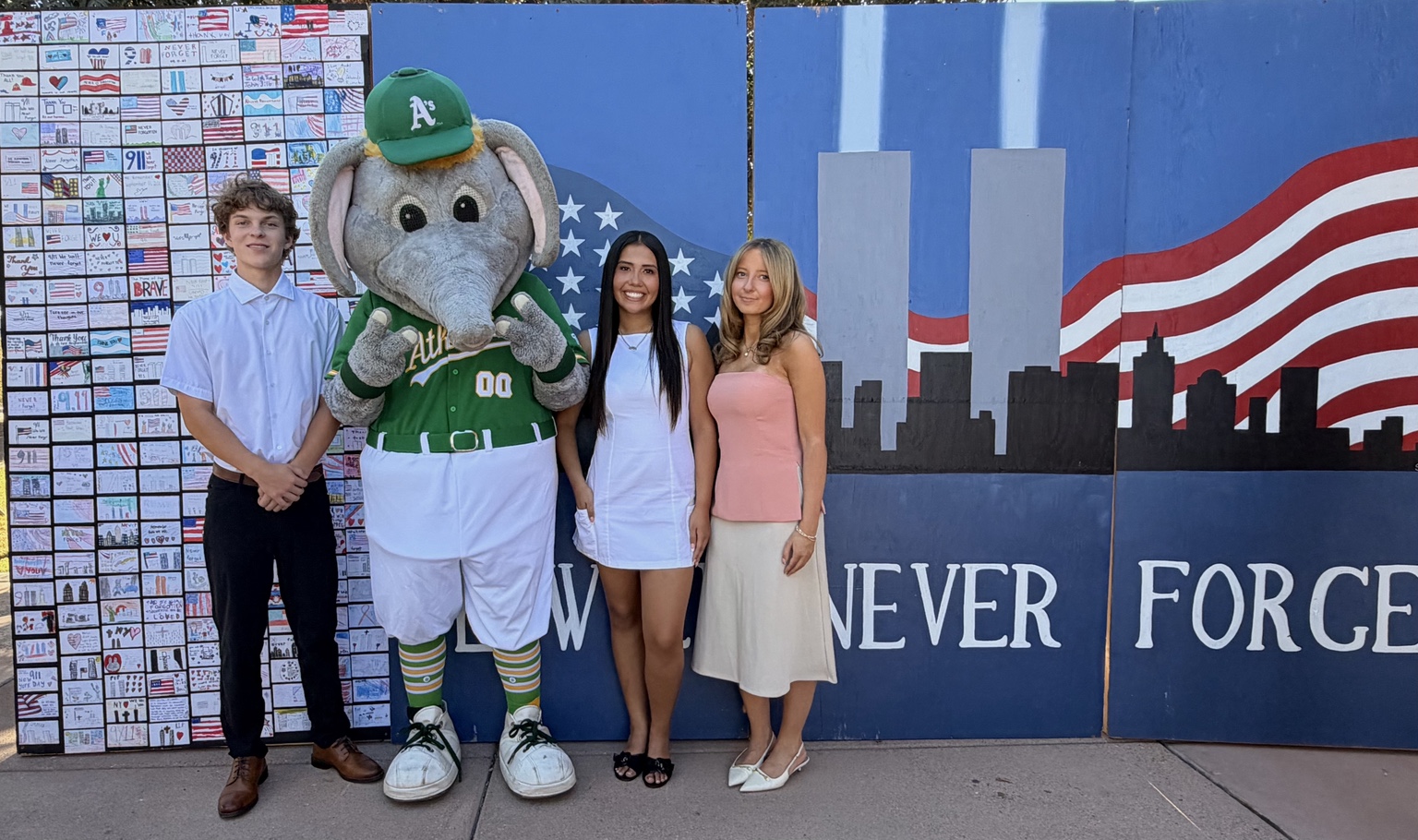 Aiyana Castro and youth with Las Vegas Athletics mascot Stomper at the Remembrance Wall