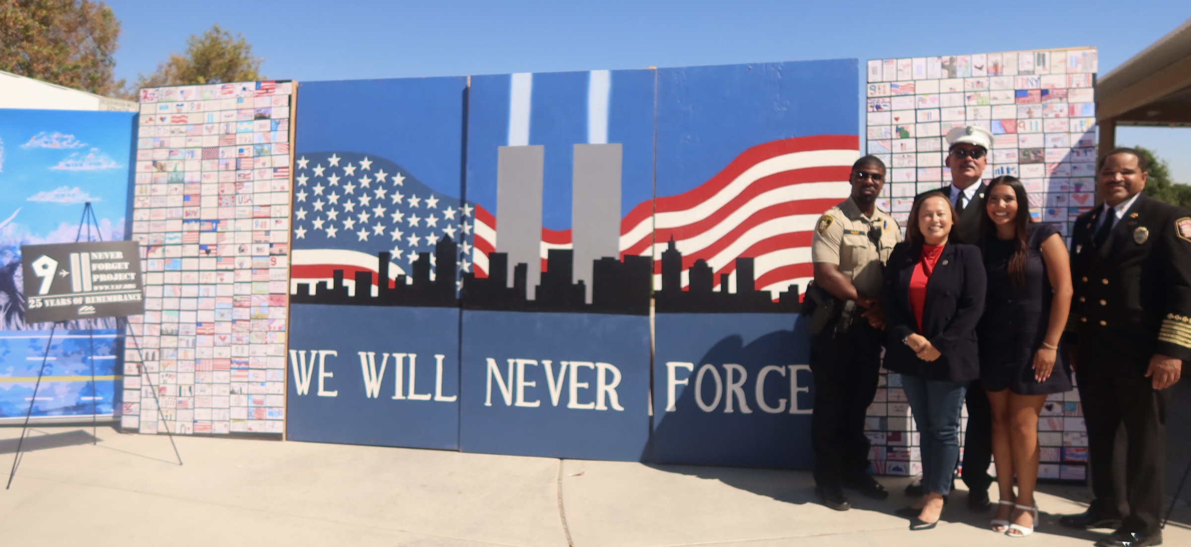 Guests reading CCSD student messages on the Las Vegas 9/11 Remembrance Wall